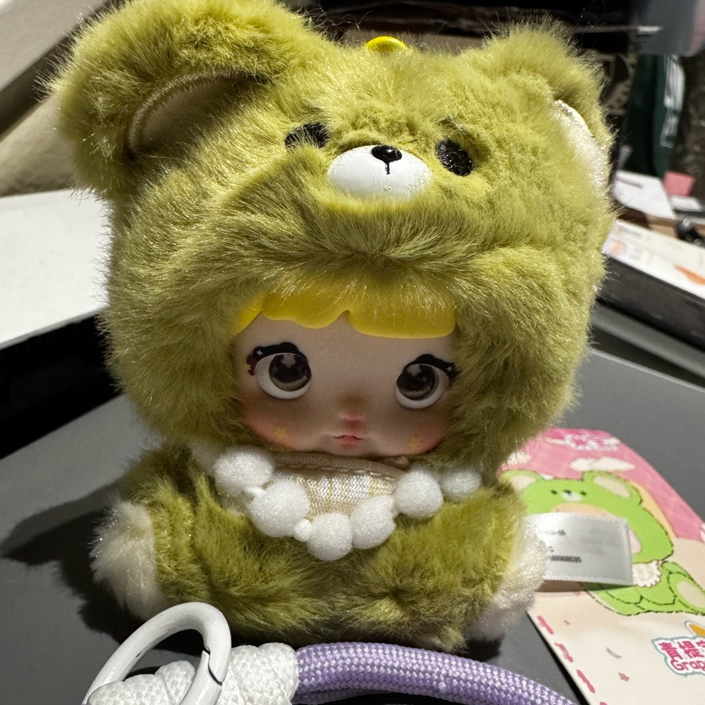 Authentic Nommi V3 plush pendant Grape. No box. Card available.